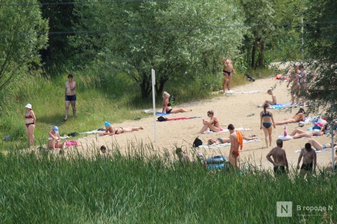 Спасение от адского пекла: фоторепортаж с пляжей Нижнего Новгорода - фото 29